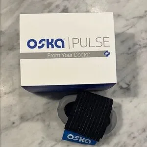 Oska Pulse | Wearables | Pulse Black Wearable Pain Relief Device Like ...